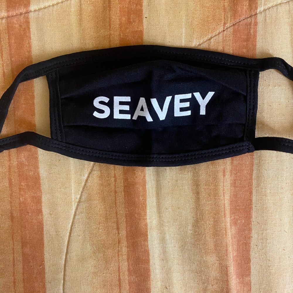 A Daniel “SEAVEY” black and white face mask